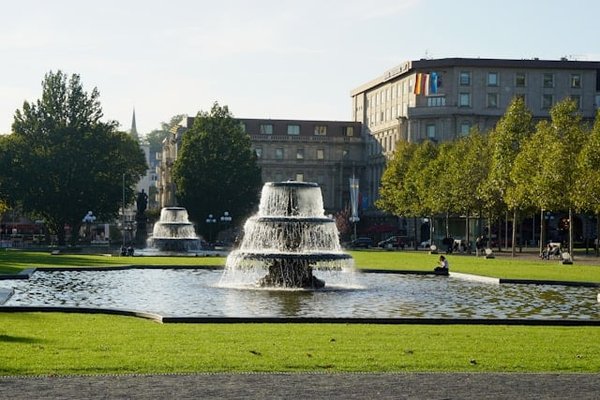 What are the best practices for incorporating public and green spaces into urban real estate developments?